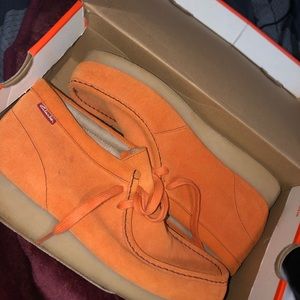 Orange Suede Clark’s wallabies sz. 10.5